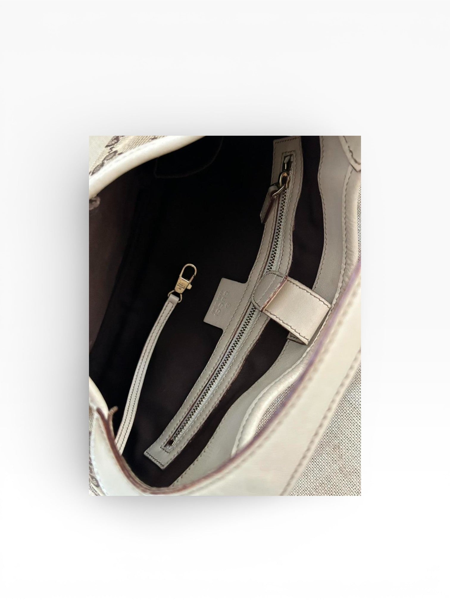 Gucci GG Canvas Punch Hobo Bag